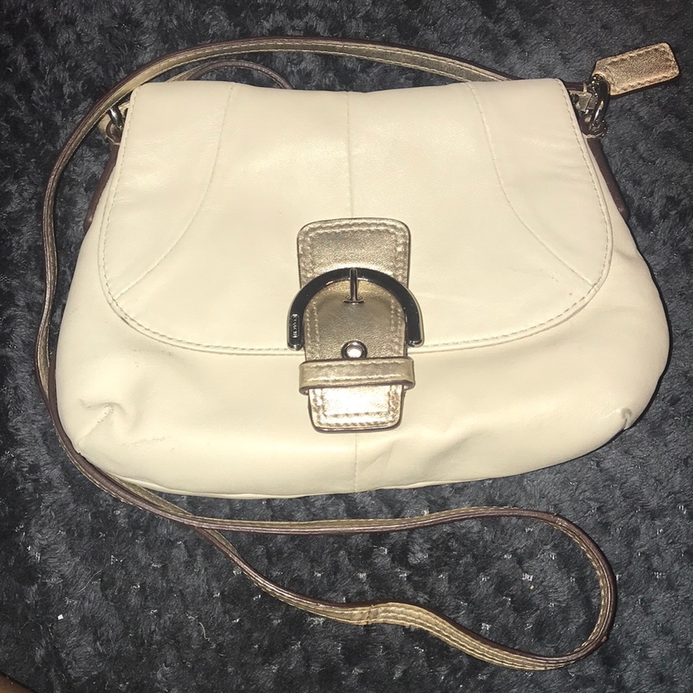 Slightly used cream white coach cross body purse